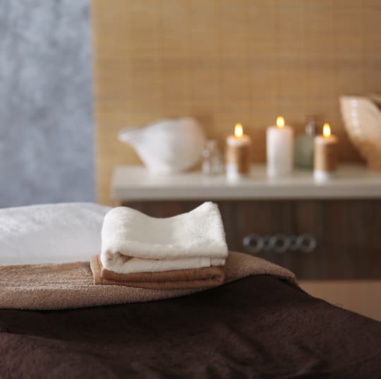 Massage table with towels